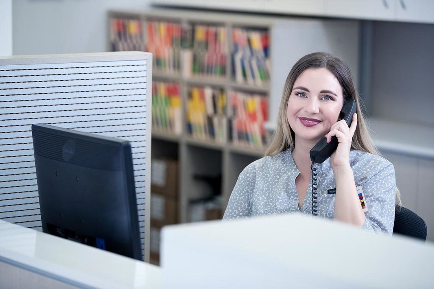 Surg Lng Receptionist On Phone